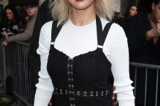 a newly blonde Selena Gomez recently added tousled, feathered bangs to her look
