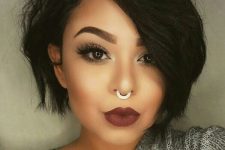 a septum piercing accented with a double pearl hoop earring is a fantastic idea with a slight girlish feel