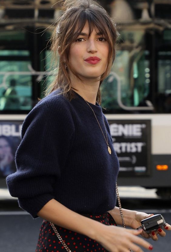 a super messy and wavy updo with Birkin bangs is ultimate Parisian chic to try right now