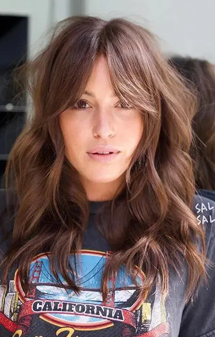 a wavy shag haircut is for those with naturally wavy hair who want a low-maintenance and laidback look that’s still stylish and sexy