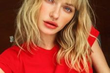 bangs are so popular right now and if you opt to pair them with a shaggy long bob haircut, your look will be taken to the next level