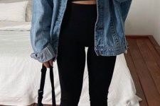 06 a simple and comfy sport chic outfit with a black crop top, black leggings, black high top sneakers, a blue denim jacket and a black bag