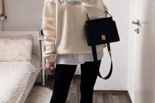 10 a sporty look for every day – black leggings, white sneakers, a white shirt, a tan sweatshirt and a black bag