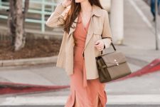 With beige jacket, sunglasses, brown leather bag and white lace up high heels