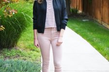 With black and white striped crop shirt, navy blue jacket, sunglasses and silver lace up flat shoes