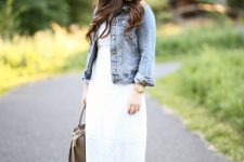 With denim jacket, gray leather tote bag and white midi dress