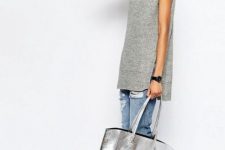 With gray long sleeveless turtleneck, distressed cuffed jeans and white and light gray sneakers