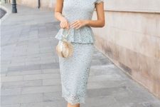 With light blue lace midi skirt, golden rounded bag and white ankle strap high heels