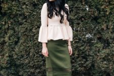 With olive green midi skirt and beige leather pumps