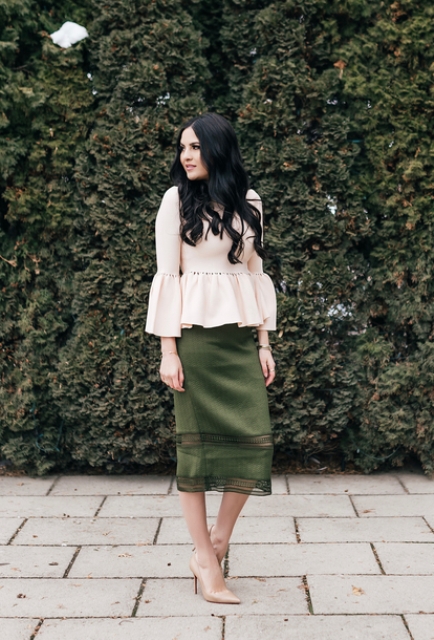 With olive green midi skirt and beige leather pumps
