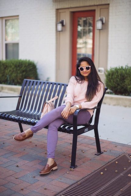With pale pink framed sunglasses, pale pink sweater, bag and brown leather flat shoes