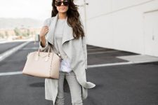 With shirt, gray waterfall coat, sunglasses, beige leather tote bag and beige pumps