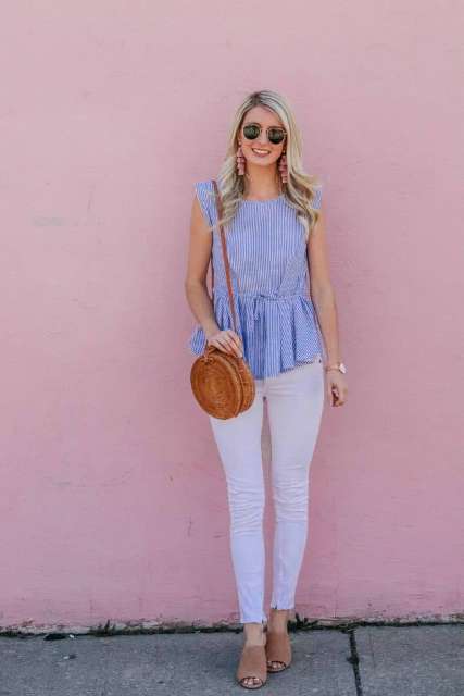 With straw rounded bag, white pants, brown sandals, sunglasses and pale pink earrings