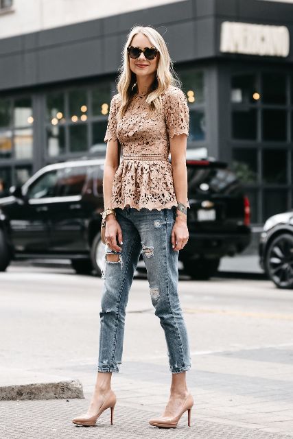 With sunglasses, super distressed cropped jeans and beige leather pumps