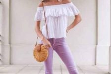 With sunglasses, white earrings, white off the shoulder ruffled shirt, straw rounded bag and brown ankle strap flat sandals