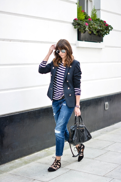 With white and navy blue striped shirt, blazer, distressed jeans, black leather bag and black lace up flat shoes