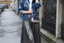 With white t-shirt, floral printed denim jacket, silver pleated midi skirt and white leather shoes