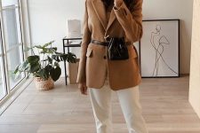 a lovely work outfit with a camel blazer, white jeans, white shoes, a brown waist bag is a lovely idea with plenty of style