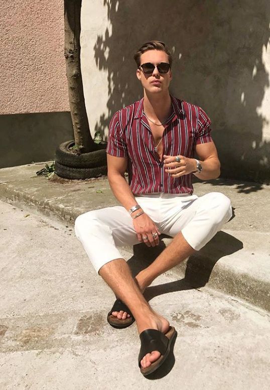a red vertical striped shirt, white short pants, black slippers and layered necklaces for a chic and sexy summer look