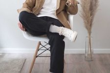 a white t-shirt, a tan velvet overshirt, black jeans, white socks and creamy sneakers for spring or fall – very casual and stylish