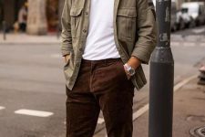 a white t-shirt, brown velvet trousers, a grey army jacke, whiye sneakers for a simple casual and very comfortable look