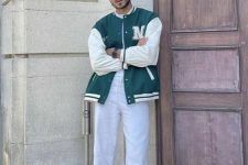 a white t-shirt, white jeans, a green bomber jacket and green trainers for a back to school inspired look