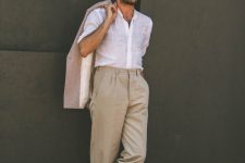 tan wideleg trousers, a white linen button down, a beige oversized blazer and white sneakers for a summer day