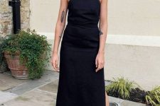 03 a black midi dress with a side slit and spaghetti straps plus white strappy sandals are a chic look for a summer brunch
