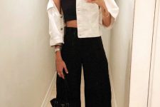 04 a black crop top and high waisted pants, checked slipons, a white denim cropped jacket and a black bag
