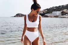 04 a comfortable white bikini with a top with thick straps and a high waisted bottom is a trendy solution to try on the beach
