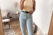 09 a buttery yellow halter neckline top, bleached jeans, a black belt, white slides are a nice idea for every day