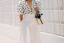 16 a white polka dot shirt, a white linen A-line midi skirt, espadrilles and a two-tone bag plus layered necklaces