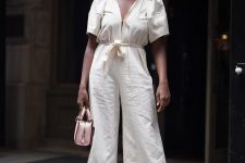 17 a beautiful and romantic work look with a creamy linen jumpsuit, short sleeves and flare pants, brown tie up shoes and a blush bag