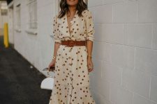 19 a beautiful neutral polka dot midi shirtdress with a brown belt, silver lace up shoes and a white bag with a ring handle