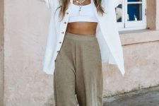 28 a white bra top, an oversized white shirt, grey linen pants, layered necklaces – add slides or sneakers adn go