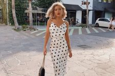 30 a white polka dot slip midi dress, a white belt, black shoes and a black bag are a gorgeous combo for a date