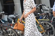 31 a white polka dot wrap midi dress with bow sleeves, white slingbacks and an amber handbag are a great combo for summer