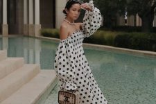 32 an off the shoulder white polka dot midi dress with puff sleeves, a woven box bag and sandals for a summer vacation