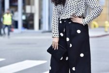 33 a catchy total polka dot look with a shirt and culottes, black heels and a black handbag are a lovely and playful outfit