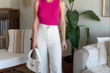 34 a simple summer work look with a fuchsia sleeveless top, white high-waisted flare jeans, white sneakers and a white bag
