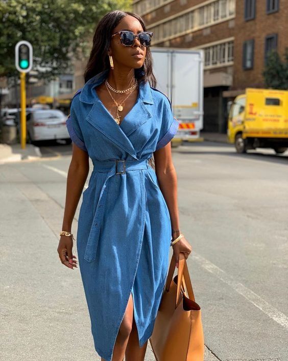 a blue denim wrap dress with a belt and an amber leather tote, layered necklaces for a lovely summer look