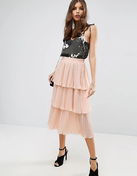 With black and white floral printed sleeveless top, black chain strap mini bag and black cutout ankle strap high heels