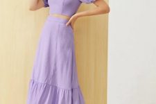 With lilac high-waisted ruffled midi skirt and white leather heeled mules