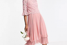 With pale pink lace bell sleeved blouse and white ankle strap heeled sandals