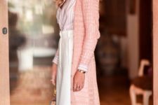 With white and pale pink striped button down shirt, cream high-waisted palazzo pants and pale pink bag