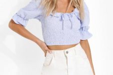 With white distressed denim high-waisted shorts
