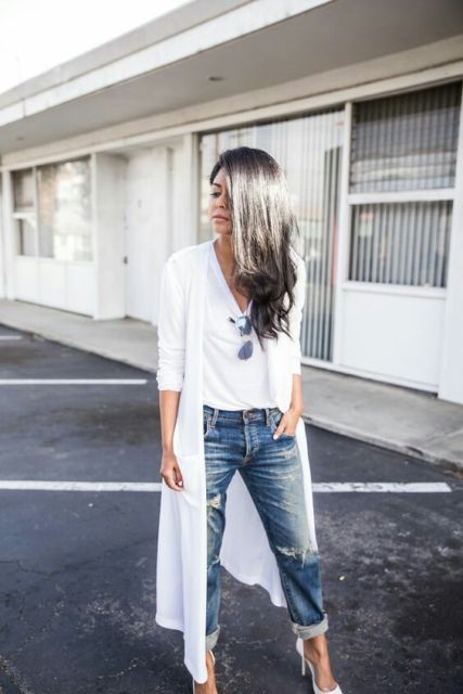 With white shirt, sunglasses, distressed cuffed jeans and white pumps