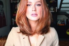 a beautiful red clavicut with copper and gold balayage and much volume is a lovely and pretty idea for any girl who loves red