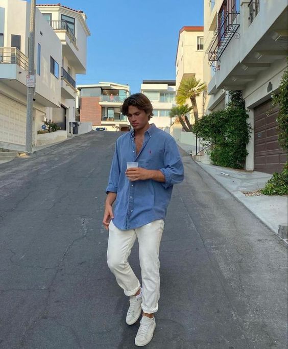 a casual summer date look with an oversized blue button down, white jeans and white sneakers is easy to repeat and looks nice