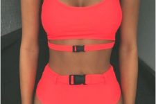 a cool and bold neon red bikini with a belt top and bottom is a catchy idea that looks modern and fresh